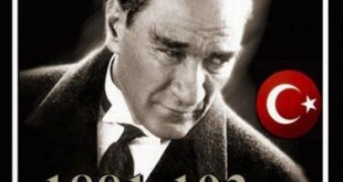 Siyah fonda 1881-1938 yazılı anma afişi ve Türk bayraklı siyah beyaz portre