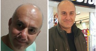 Mağaza önünde yan yana duran iki erkeğin yakın plan görünümü
